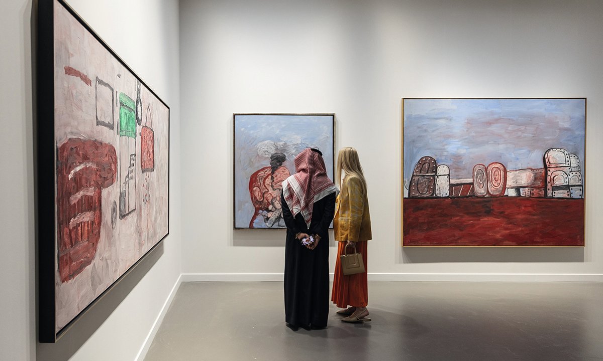 Framed print in a gallery setting representing entry-level collecting strategies.