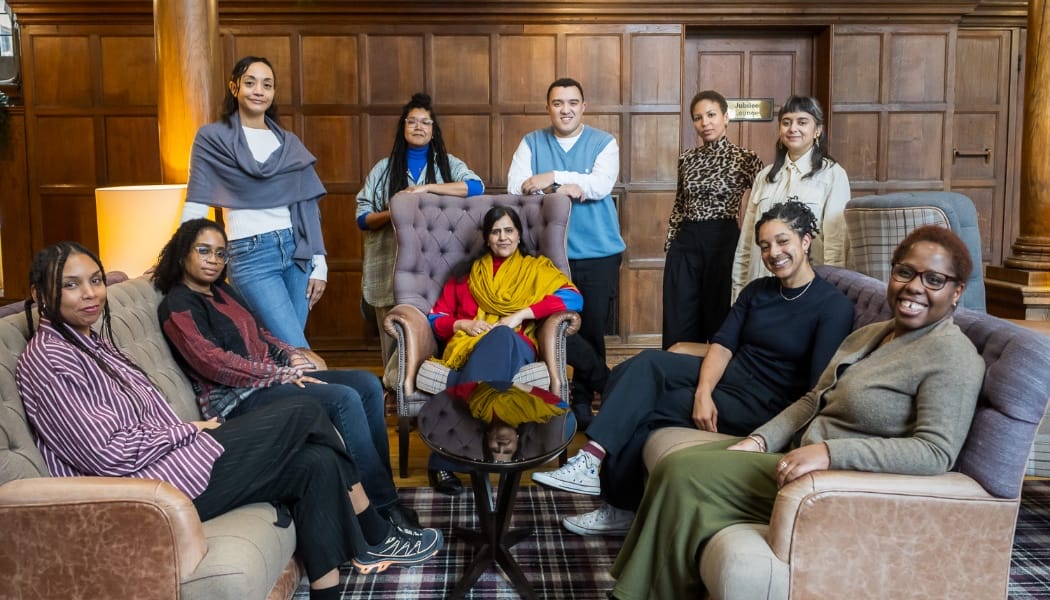 Group portrait of the first Empowering Curators cohort during a January 2026 residency.