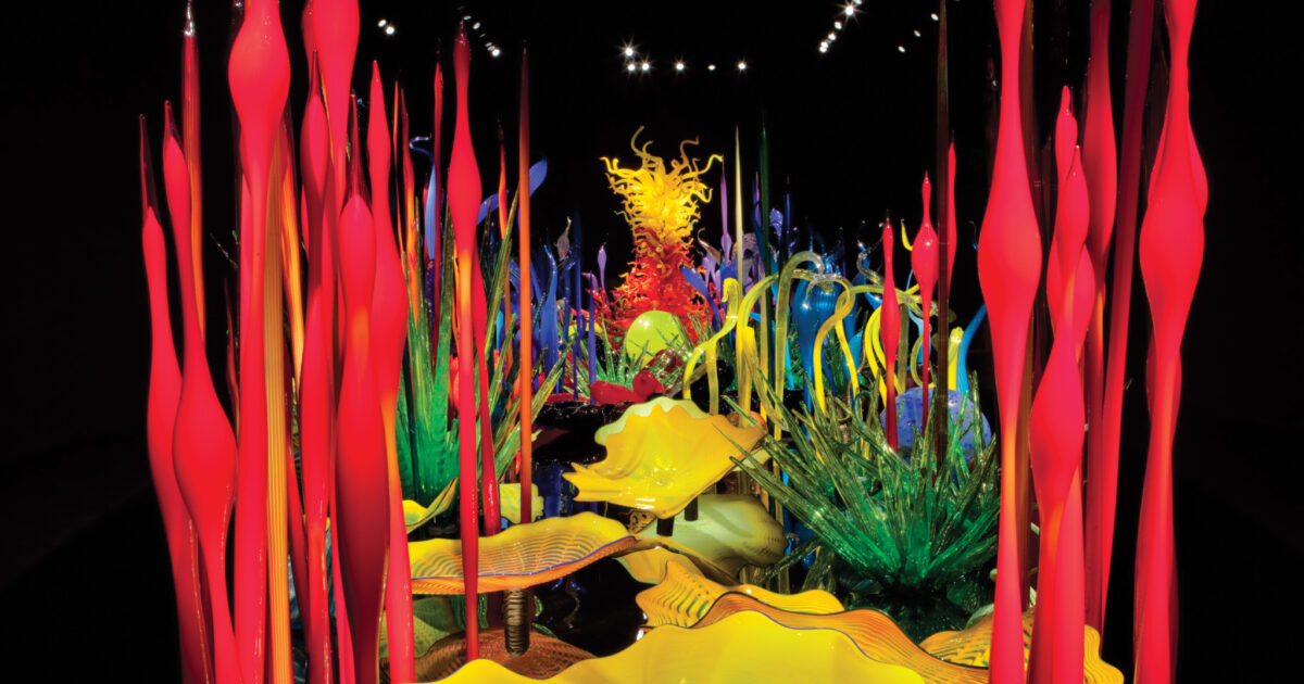 A dense installation of multicolored blown glass forms in the Sealife Room at Chihuly Garden and Glass.