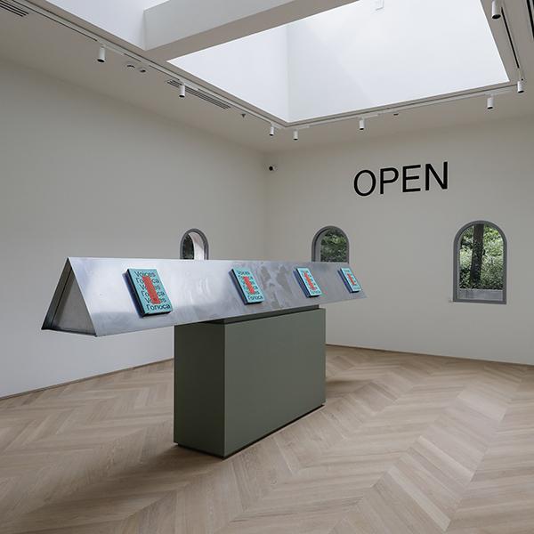 View of the Biennale site architecture used as a backdrop for institutional programming.