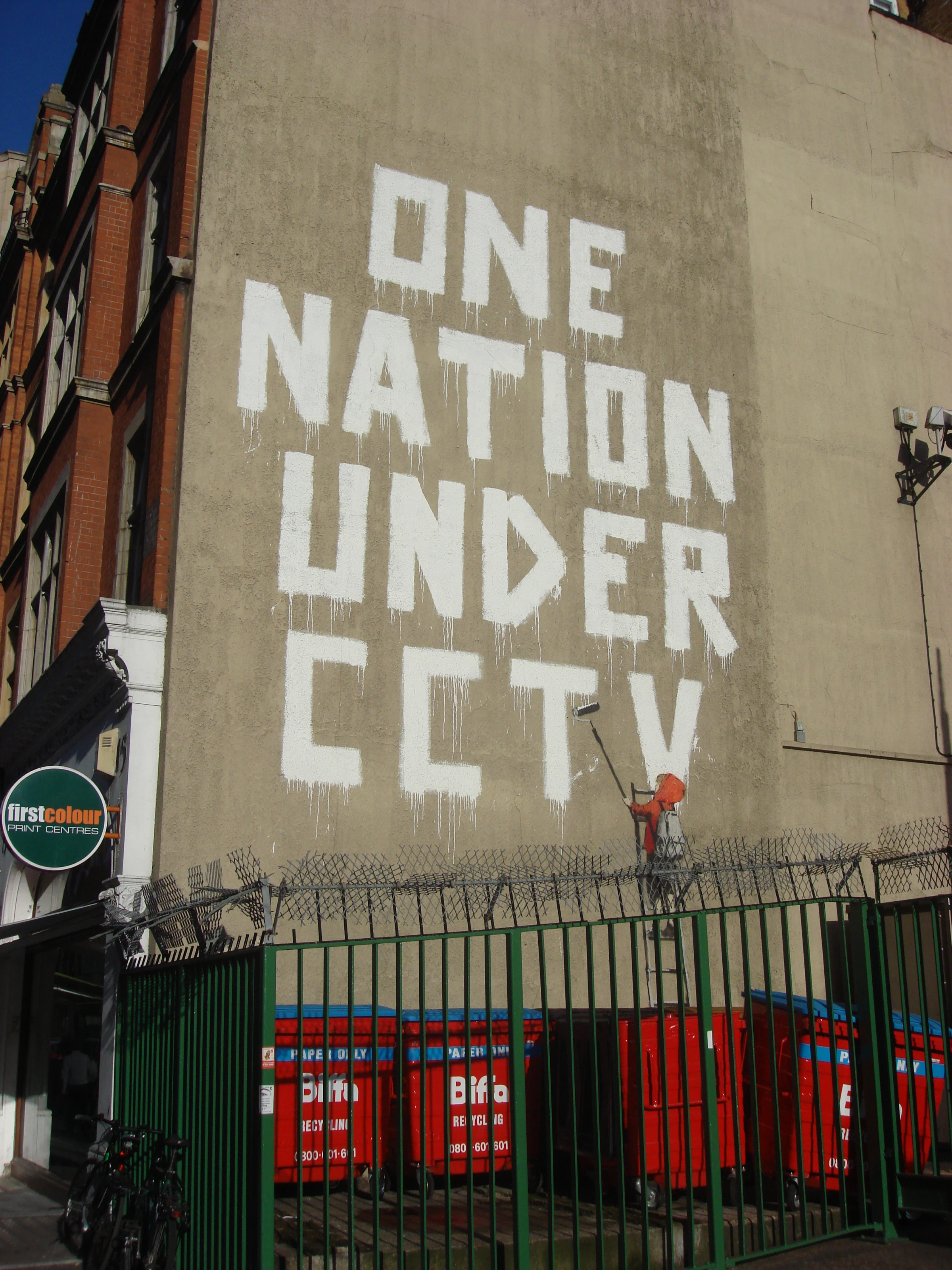 Close view of the Banksy mural 'One nation under CCTV' in London.