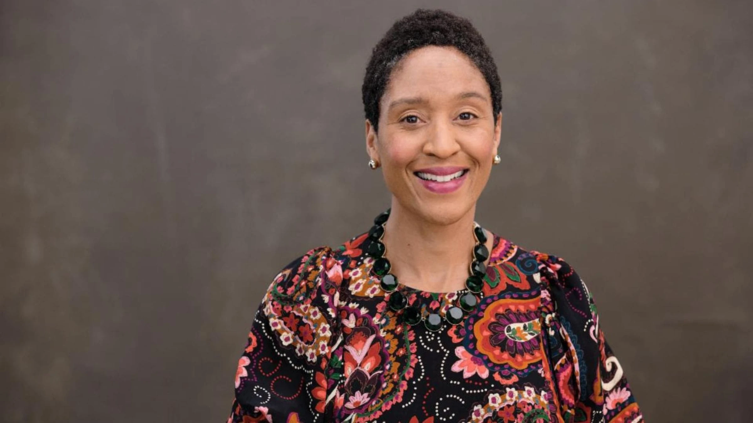 Portrait of curator and scholar Makeda Best against a neutral background