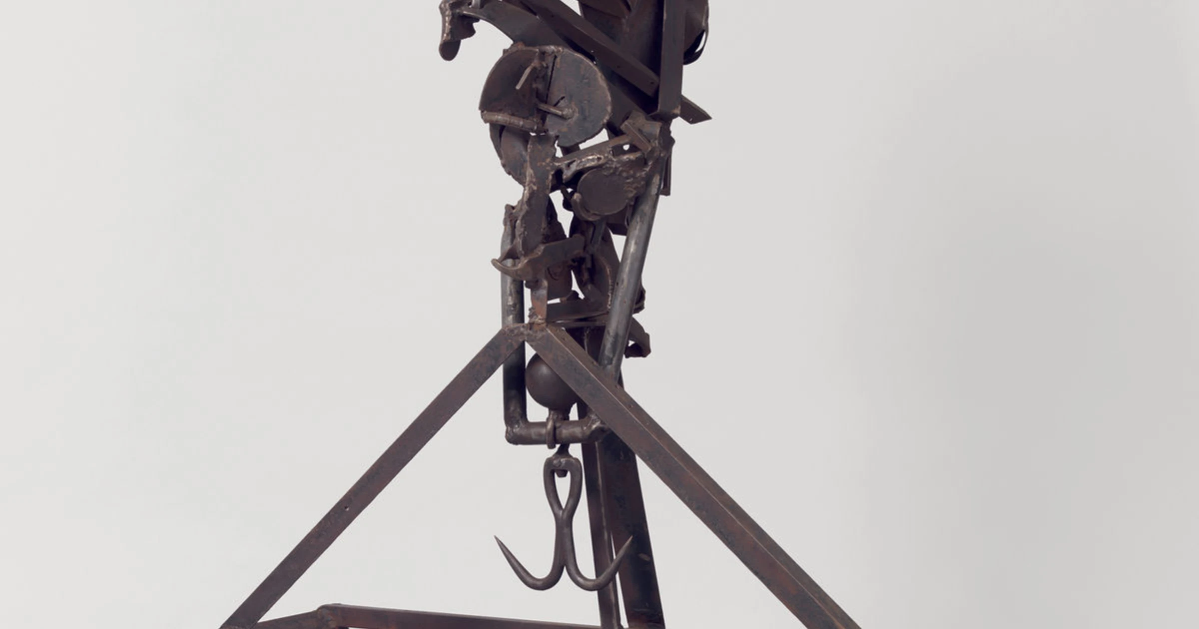 Metal sculpture by Melvin Edwards with welded steel forms and sharp industrial elements.