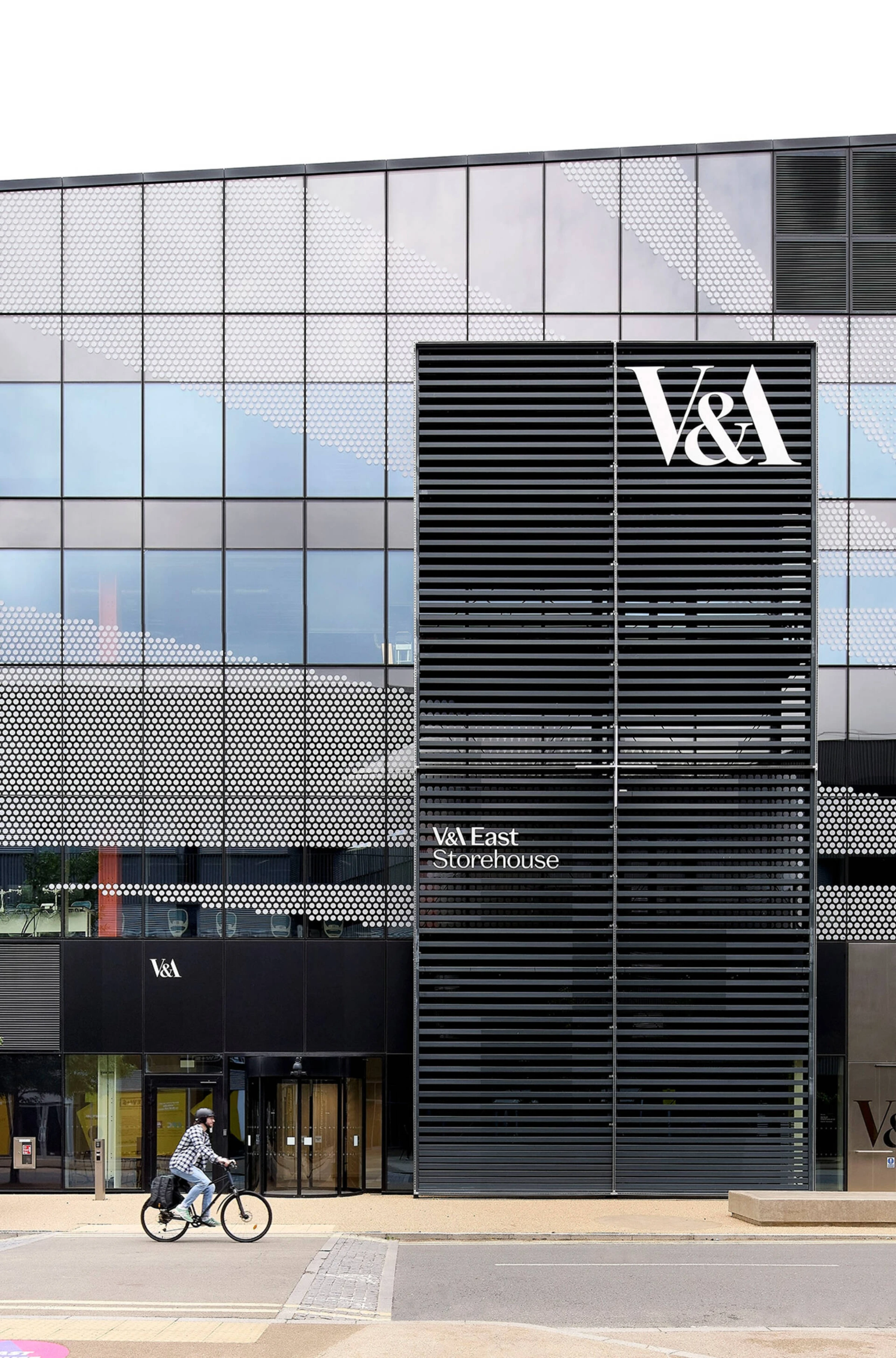 Museum gallery interior with historic objects on view.